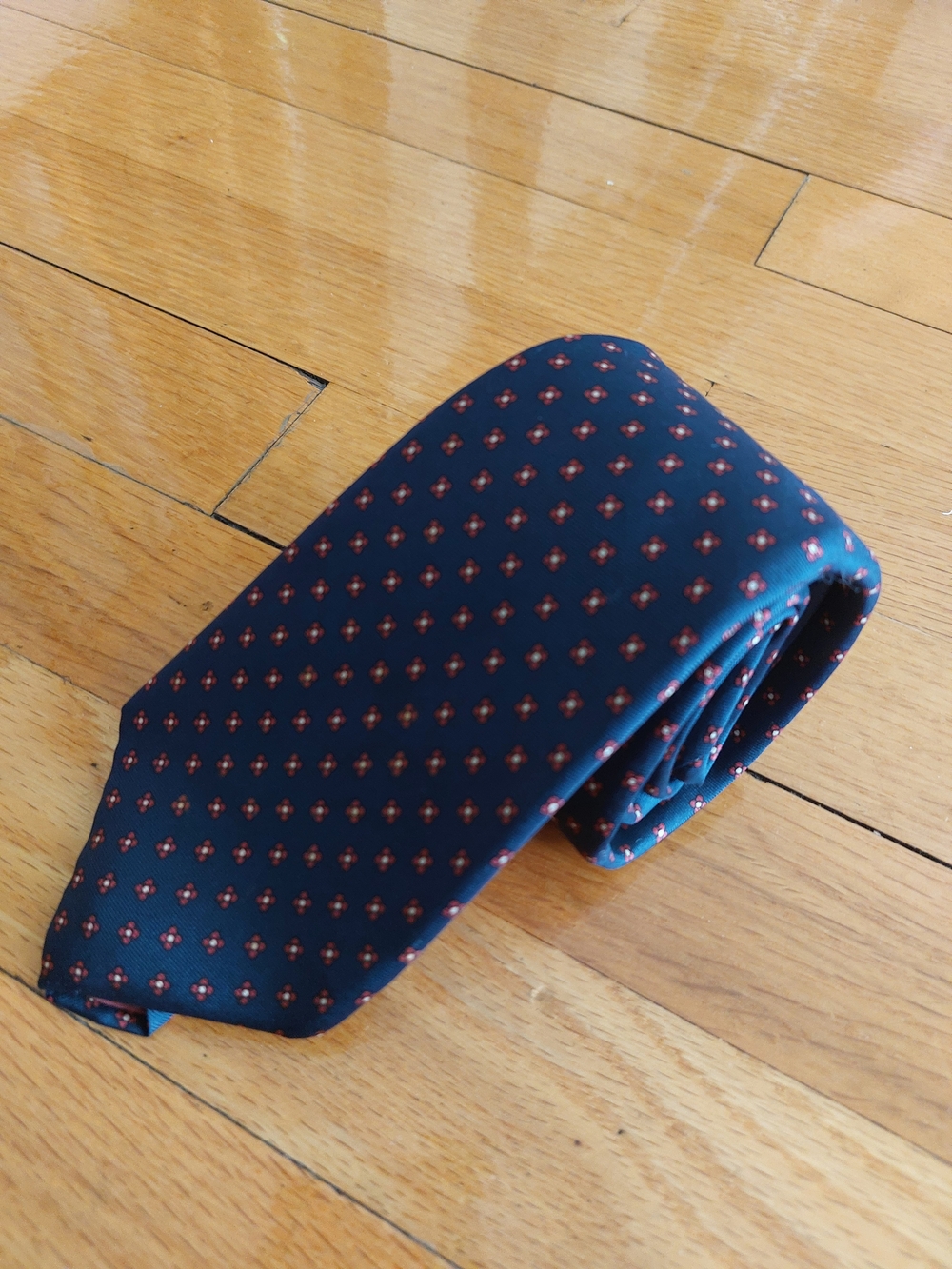 Bert Pulitzer Navy Tie with Small Maroon Medallion Pattern